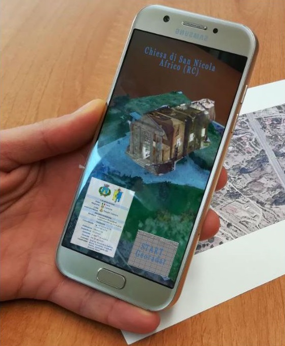Smartphone with the augmented reality app opened showing how a church looked like in the past