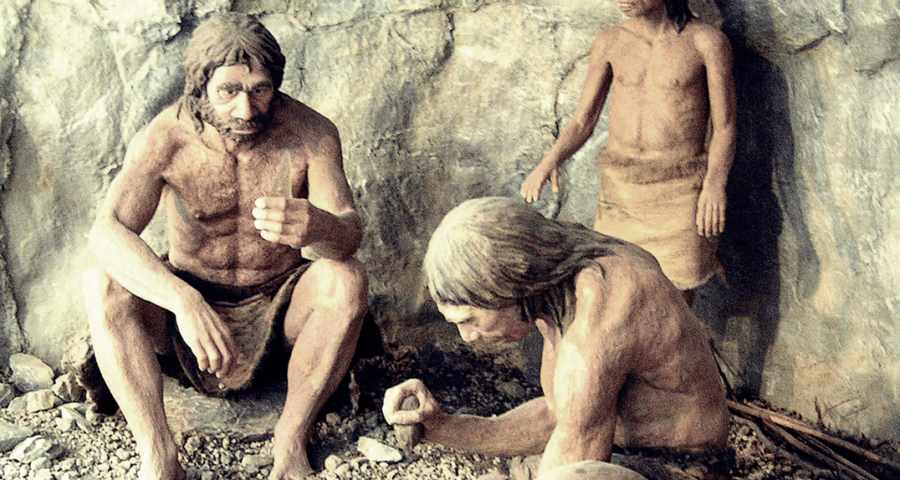 Diorama of Neanderthals family.